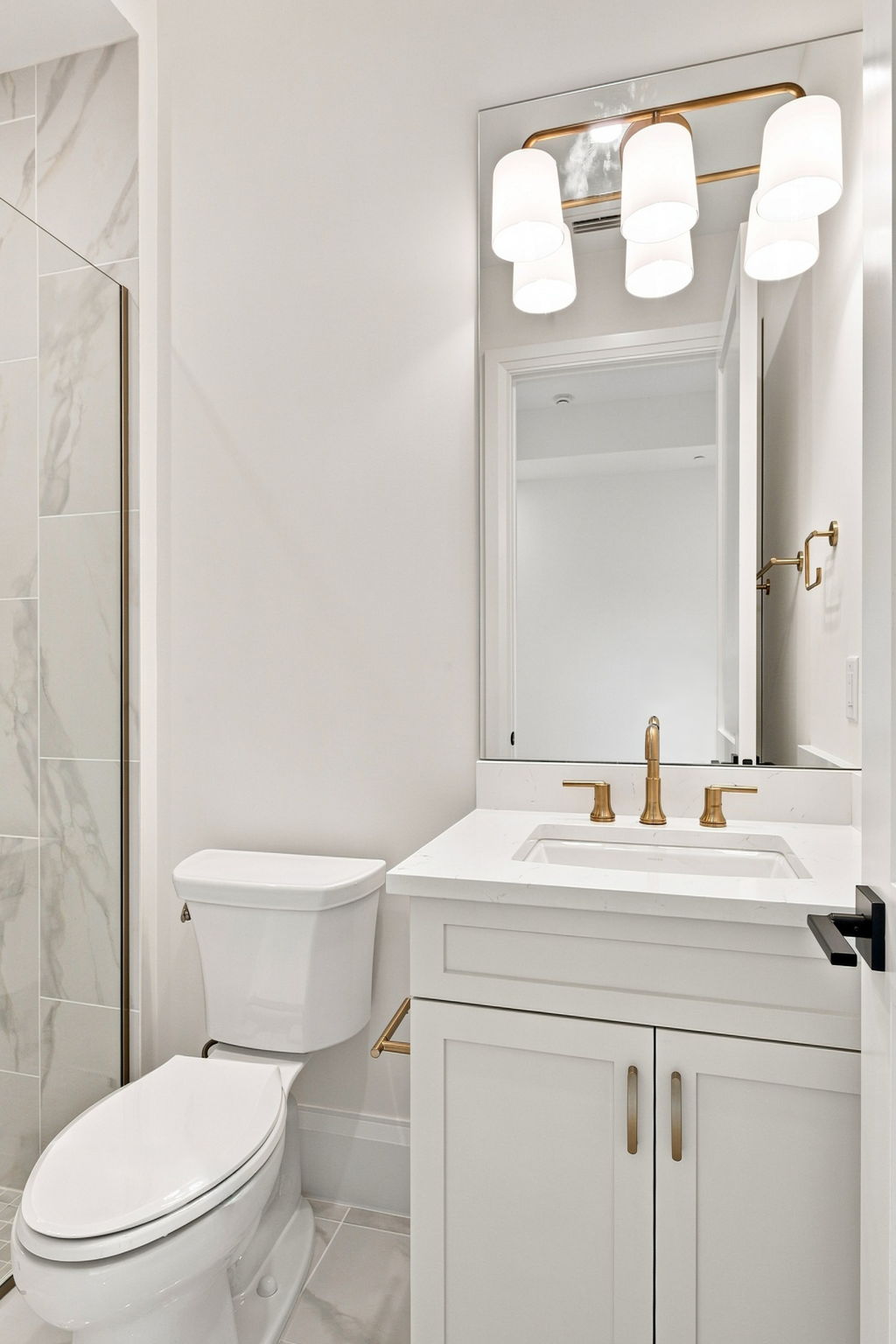 Nerano Lucca Miromar Lakes Guest bathroom