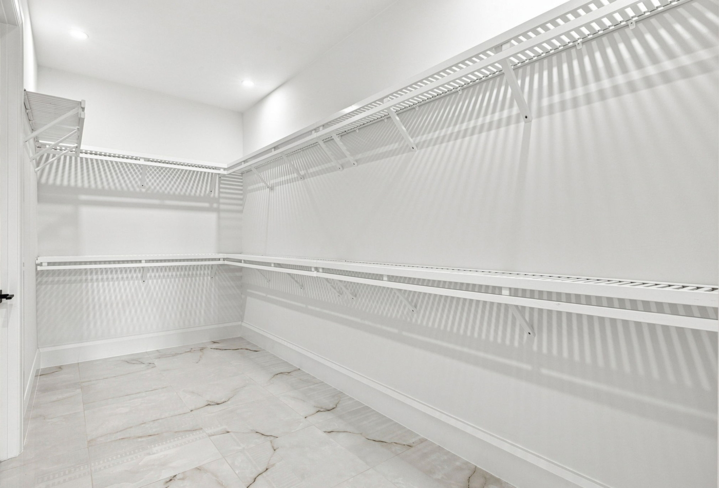 Nerano Lucca Miromar Lakes primary bedroom walk in closet