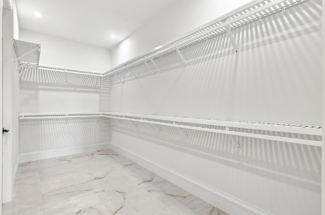 Nerano Lucca Miromar Lakes primary bedroom walk in closet