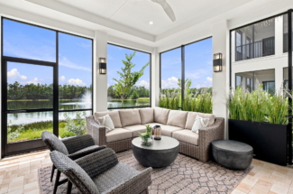 Nerano Lucca Miromar Lakes patio space with lake and nature preserve views